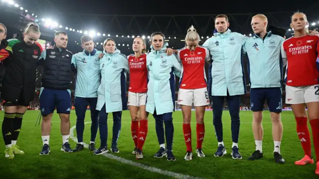 Renee Slegers  - Interim Manager of Arsenal, talks to her team during the post-match huddle 