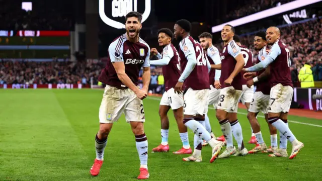 Marco Asensio of Aston Villa celebrates scoring