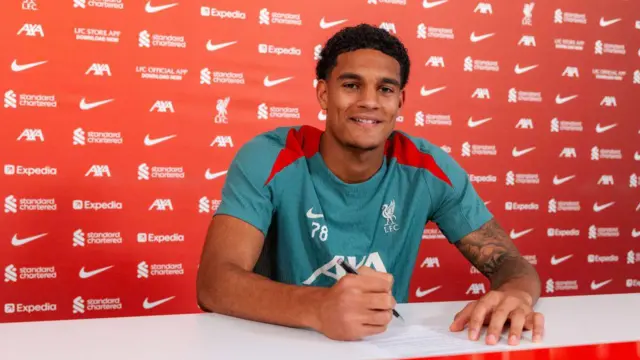 Jarell Quansah of Liverpool signs his new contract