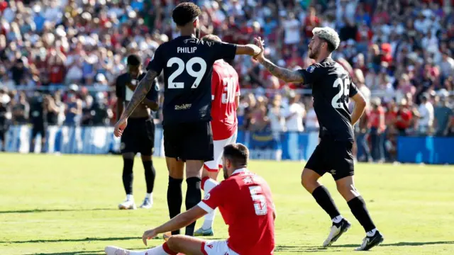 Marco Senesi celebrates scoring for Bournemouth against Wrexham