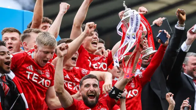 Aberdeen Captain Graeme Shinnie lifts with the Scottish Gas Scottish Cup Trophy during the Scottish Gas Men's Scottish Cup Final between Aberdeen and Celtic at Hampden Park