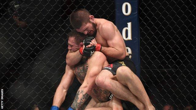 Khabib Nurmagomedov submitting Conor McGregor with a rear-naked choke