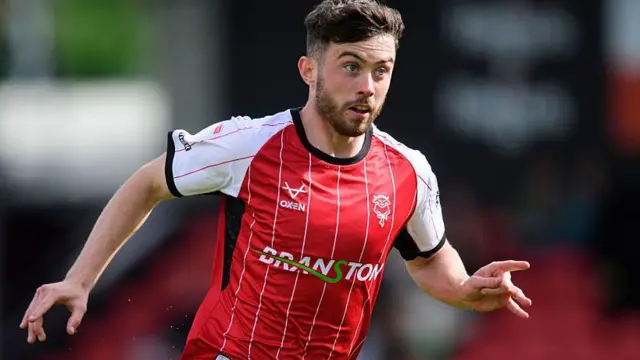 Sean Roughan running on the pitch