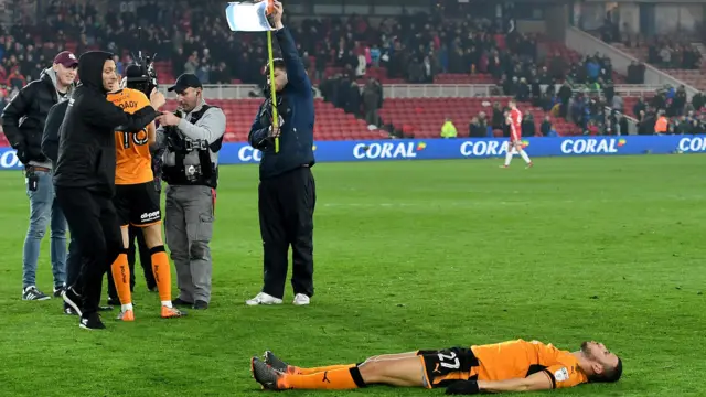 Romain Saiss lies on the pitch after Middlesbrough v Wolves in 2018