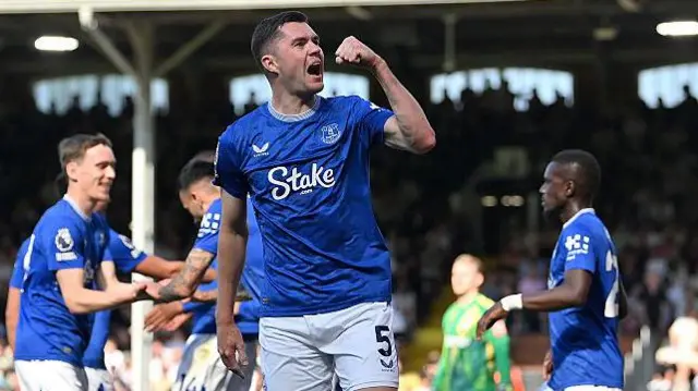 Michael Keane celebrates scoring a goal for Everton