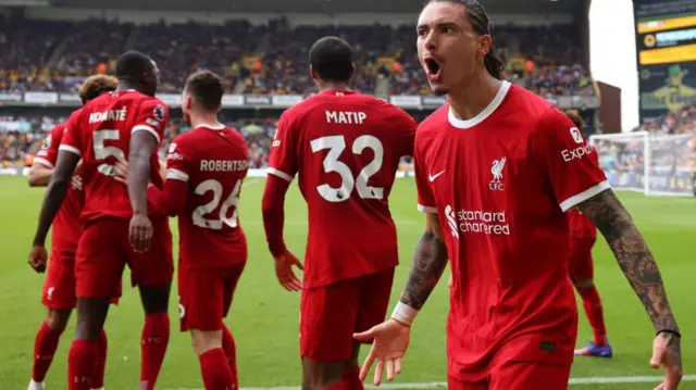 Darwin Nunez and Liverpool celebrate following a goal against Wolves.