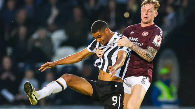 St Mirren's Mikael Mandron and Hearts' Frankie Kent