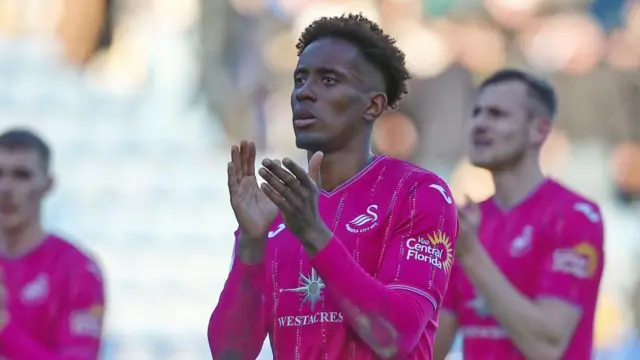 Jamal Lowe applauds Swansea fans at Sheffield Wednesday last season