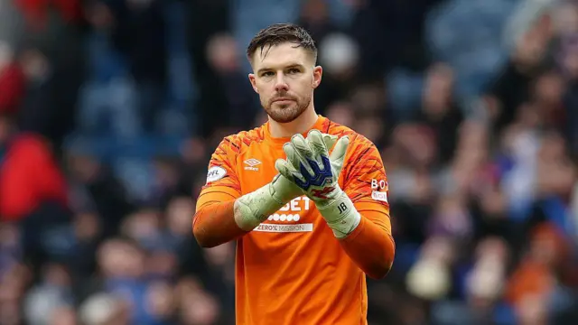 Jack Butland claps at end of match