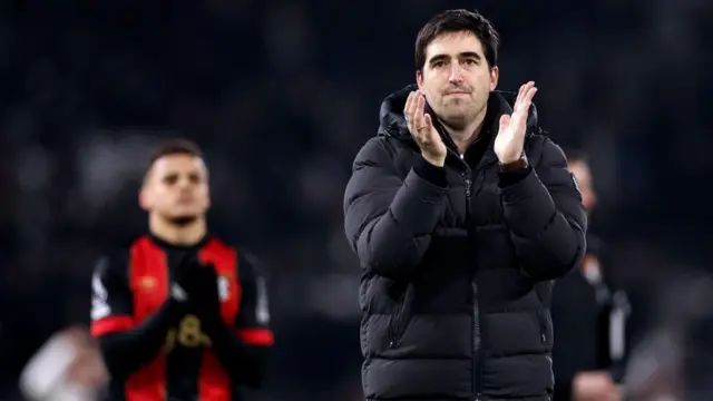 Andoni Iraola, Manager of AFC Bournemouth, acknowledges the fans