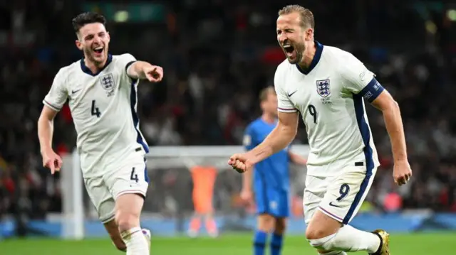 Harry Kane and Declan Rice celebrate one of Kane's 70 England goals