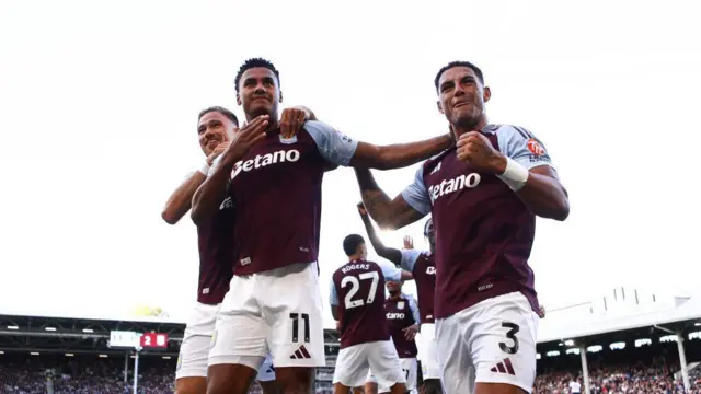 Matty Cash, Ollie Watkins and Diego Carlos celebrating a goal for Aston Villa