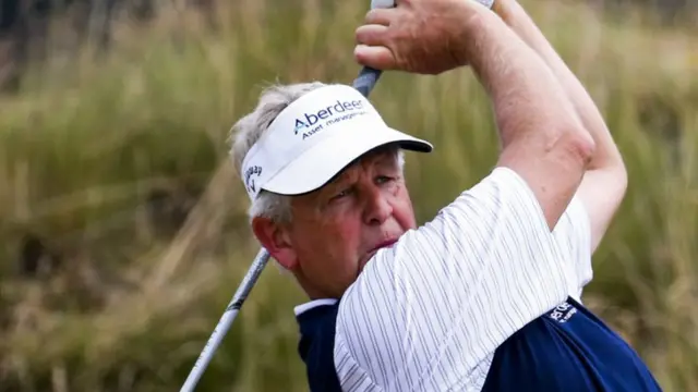 Colin Montgomerie plays a shot