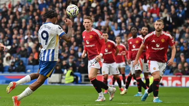 Brighton's Brazilian striker #09 Joao Pedro headers the ball to scores the team's second goal during the English Premier League football match between Brighton and Hove Albion and Manchester United