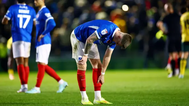 Portsmouth's Josh Knight bends over at the final whistle