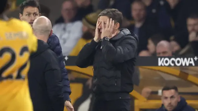 Oliver Glasner looks on with head in hands
