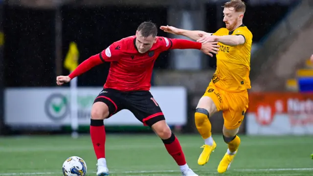 St Mirren's James Scott and Livingston's David Carson in action during a cinch Premiership match between Livingston and St Mirren