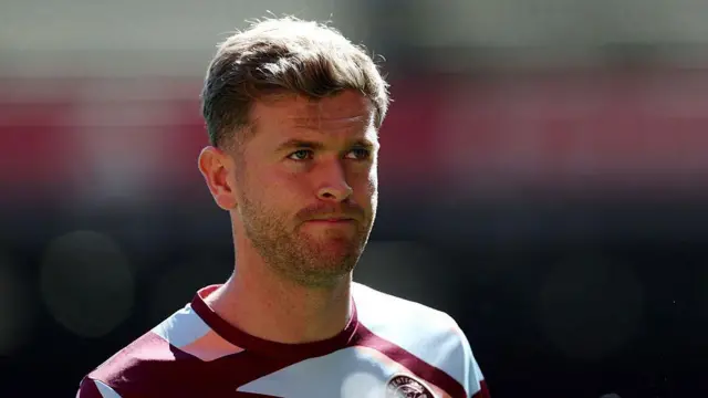 Nathan Collins of Brentford warms up