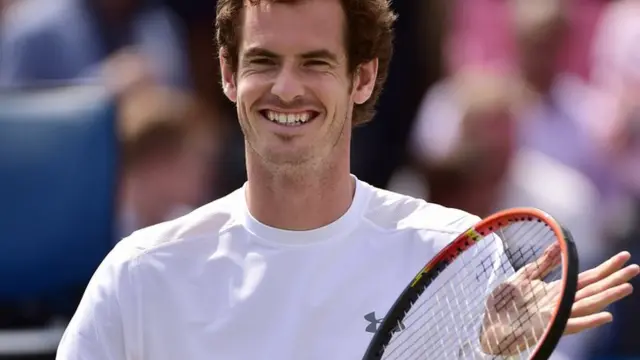 Andy Murray smiles on court