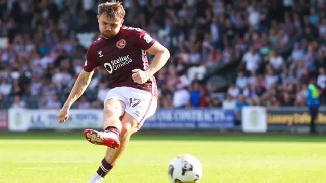 Alan Forrest scoring a penalty for Hearts