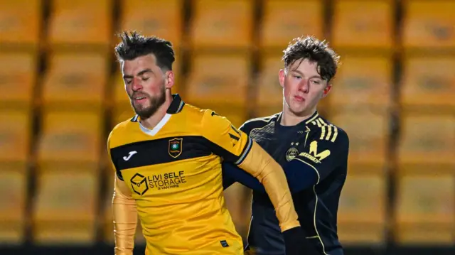 Livingston's Graham Carey and Aberdeen's Dylan Lobban
