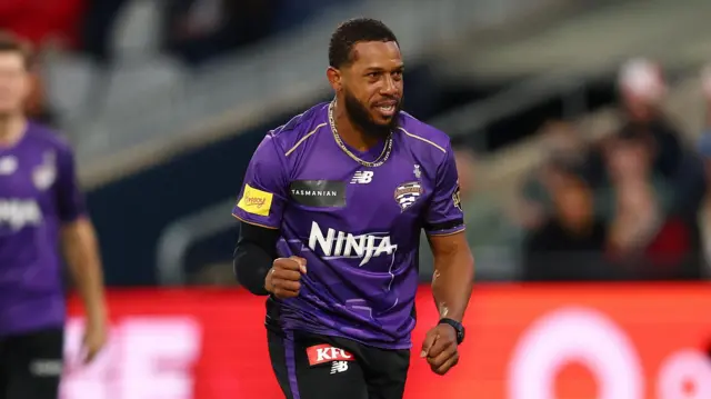 Chris Jordan celebrates taking a wicket for Hobart Hurricanes