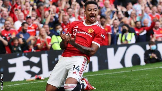 Jesse Lingard celebrates scoring a goal for Manchester United