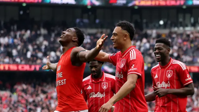 Nottingham Forest players celebrate after scoring goal