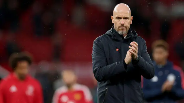 Erik ten Hag applauds Manchester United fans following the 3-0 defeat by Tottenham