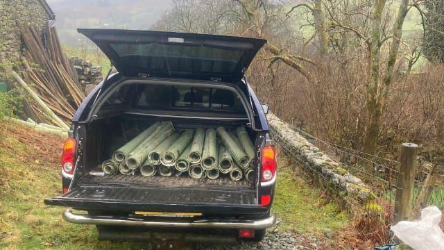 Plastic tubes in the back of a van