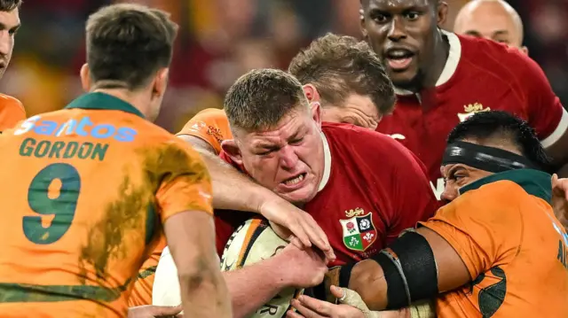 Tadhg Furlong bursts through the Australian defence