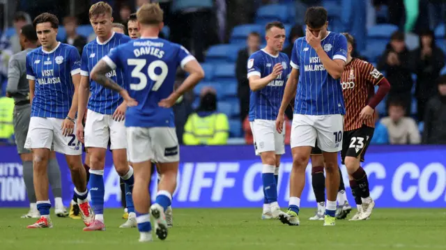 Cardiff City players looking dejected after defeat against Bradford City