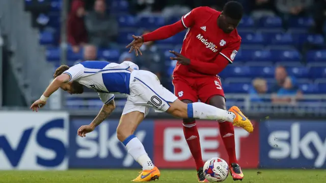 Bruno Ecuele Manga of Cardiff City tackles Matt Taylor of Bristol Rovers