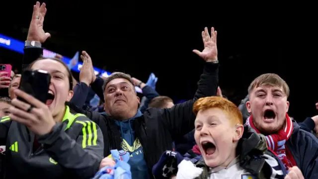 Aston Villa fans celebrate the side's winning goal against Bayern Munich