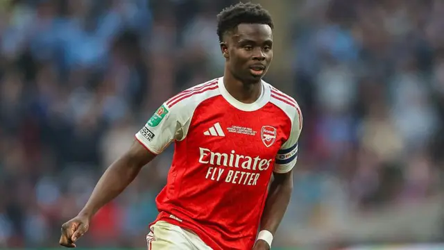 Bukayo Saka playing for Arsenal