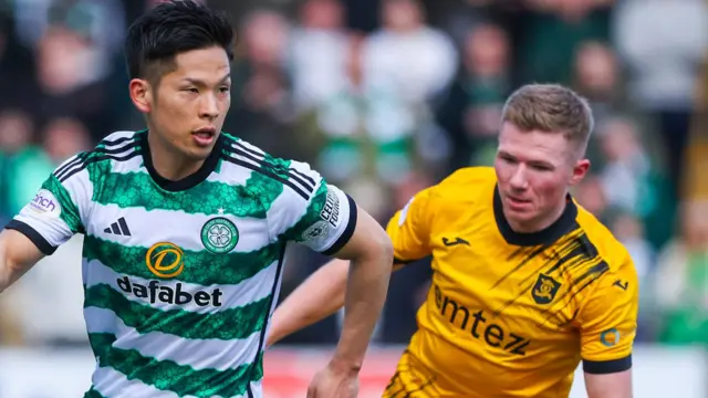 Celtic's Tomoki Iwata is closed down by Livingston's Stephen Kelly 