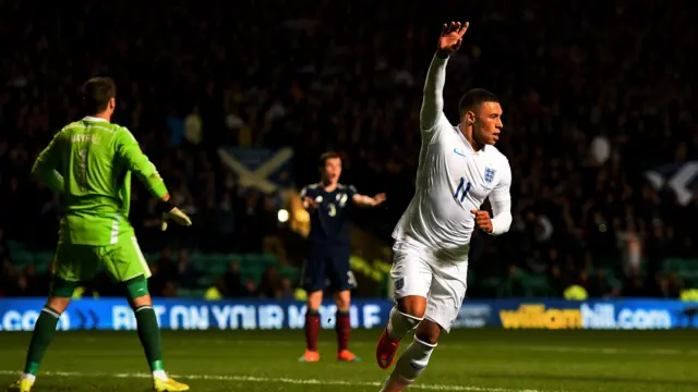 Alex Oxlade-Chamberlain celebrates after scoring