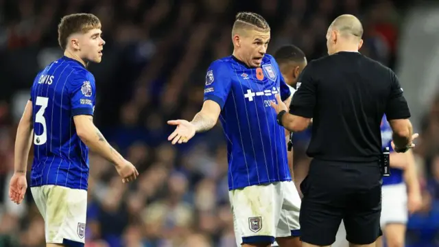 Kalvin Phillips of Ipswich Town reacts after being shown a second yellow card against Leicester City