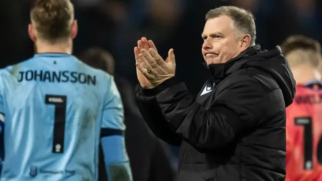 Mark Robins applauds the travelling Stoke City fans following Saturday's 1-1 draw at The Hawthorns