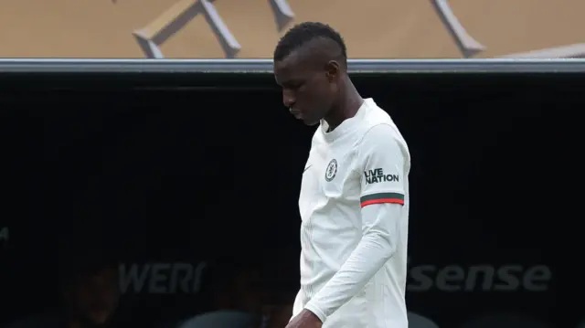 Nicolas Jackson looks dejected after being sent off