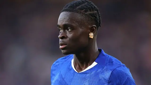 Tyrique George in a blue Chelsea shirt