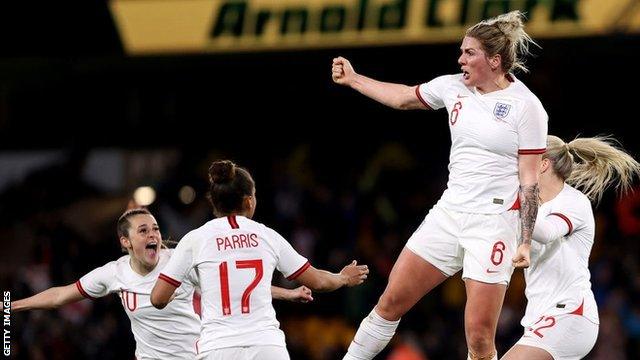 Millie Bright celebrates