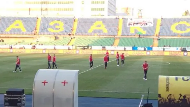 Aberdeen players on the pitch at Central Stadium