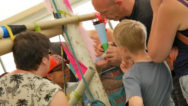 Children and adults at the Make-space tent at the Godiva Festival