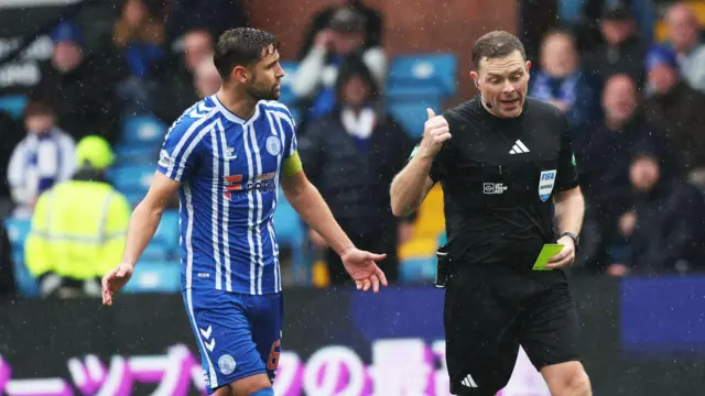 Robbie Deas talks to referee John Beaton