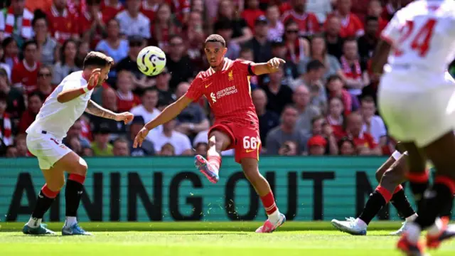 Trent Alexander-Arnold of Liverpool crosses the ball