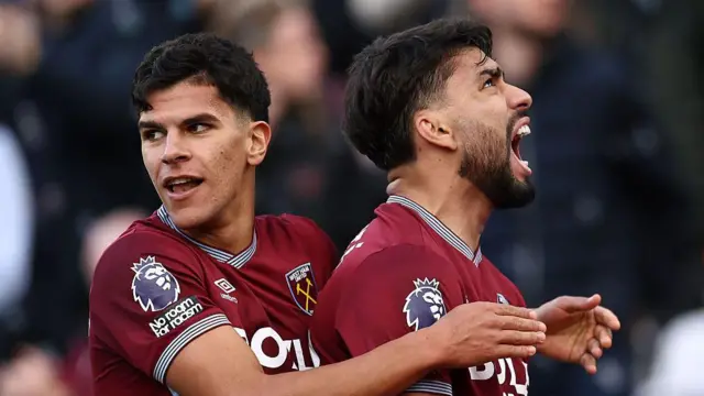 Lucas Paqueta of West Ham United celebrates and is hugged by team-mate Mateus Fernandes after scoring against Newcastle
