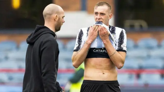 St Mirren's Craig McLeish and midfielder Killian Phillips