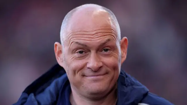Millwall boss Alex Neil smiling