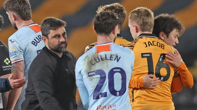 Vitor Matos and Liam Cullen after Swansea's defeat at Hull